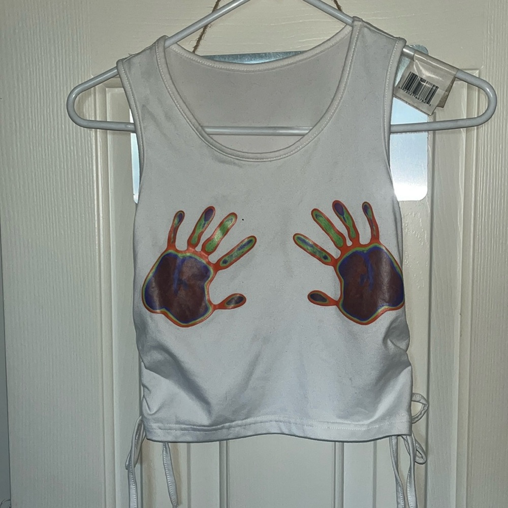 White crop top with vinyl design, ties on the side to adjust the shape